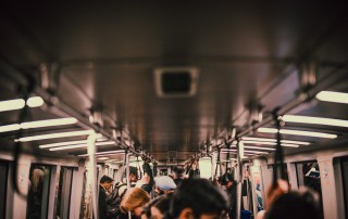 Commuters on a subway.